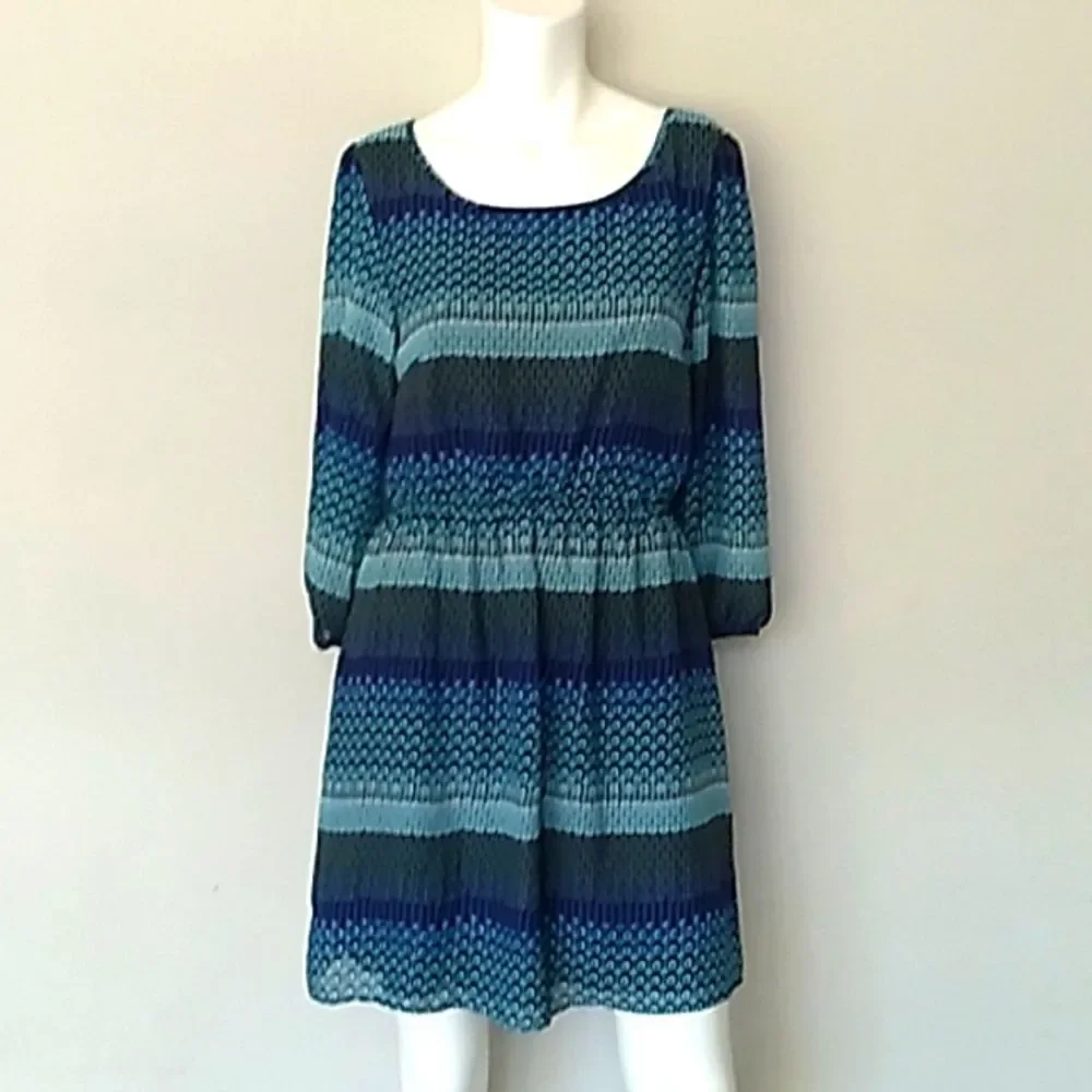 Speechless Long Slleeve Sheer Peek A Boo Back Dress. - Picture 1 of 12